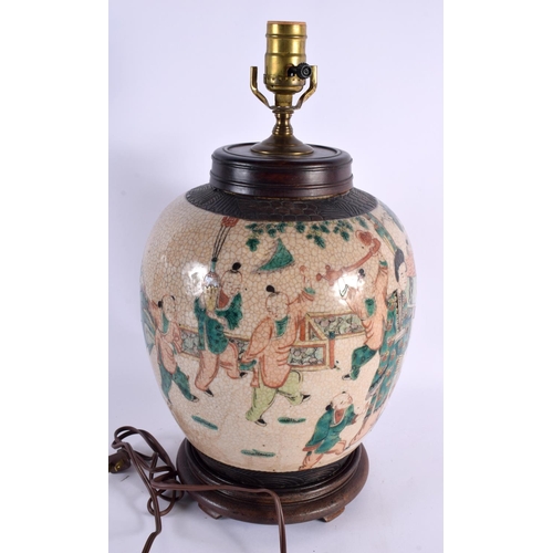 2069 - A VERY LARGE 19TH CENTURY CHINESE FAMILLE VERTE CRACKLE GLAZED LAMP Qing, painted with figures withi... 