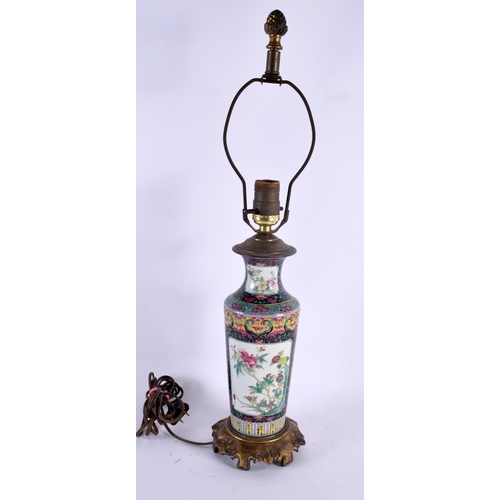 2073 - A LATE 19TH CENTURY CHINESE FAMILLE NOIRE PORCELAIN LAMP Guangxu. 54 cm high.