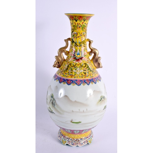 2074 - A CHINESE TWIN HANDLED FAMILLE ROSE VASE 20th Century. 29 cm x 12 cm.