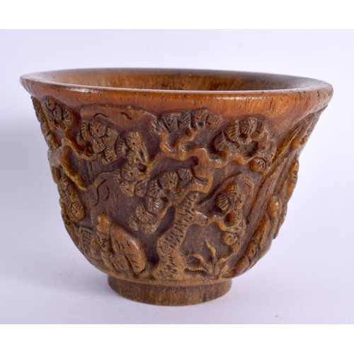 2087 - A CHINESE CARVED BUFFALO HORN TYPE LIBATION CUP 20th Century. 414 grams. 11 cm diameter.