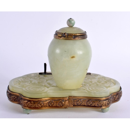 2100 - A LATE 19TH CENTURY CHINESE CARVED JADE INKWELL AND COVER Late Qing. 13 cm x 8 cm.