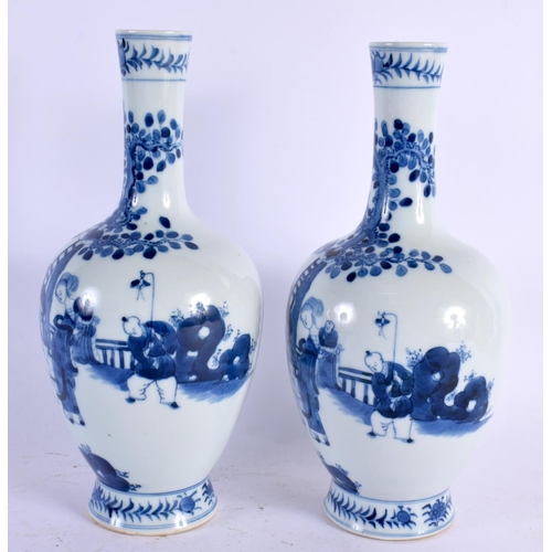 2104 - A PAIR OF CHINESE BLUE AND WHITE VASES 20th Century. 24 cm high.