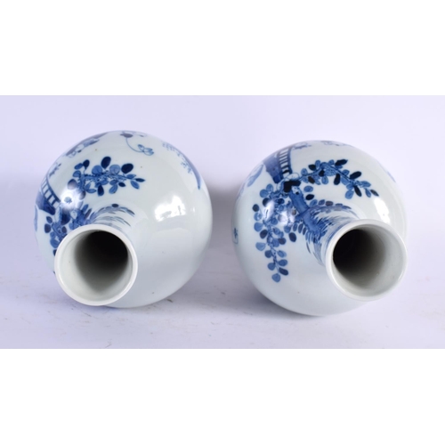 2104 - A PAIR OF CHINESE BLUE AND WHITE VASES 20th Century. 24 cm high.