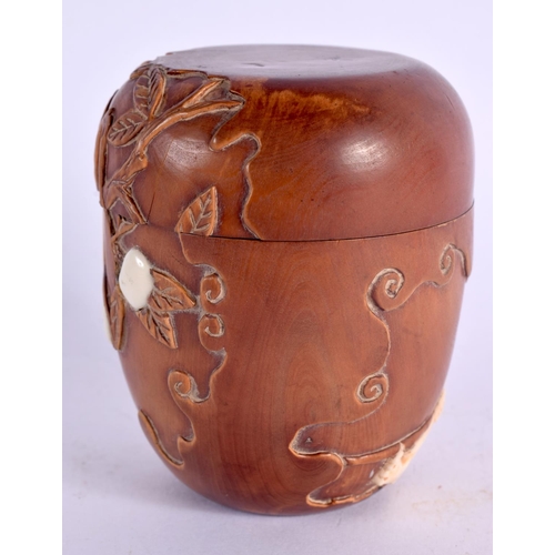 2108 - A JAPANESE CARVED BOXWOOD AND BONE BOX AND COVER. 8 cm x 6 cm.