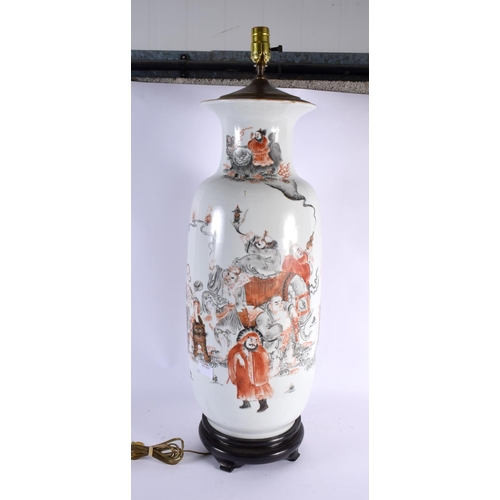 2120 - A LARGE EARLY 20TH CENTURY CHINESE PORCELAIN LAMP Late Qing/Republic, painted with immortals within ... 