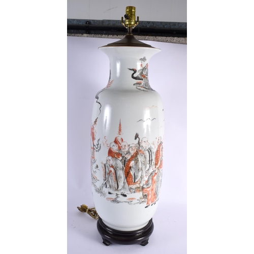 2120 - A LARGE EARLY 20TH CENTURY CHINESE PORCELAIN LAMP Late Qing/Republic, painted with immortals within ... 