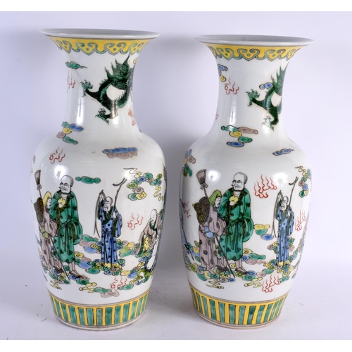 2122 - A LARGE PAIR OF CHINESE FAMILLE VERTE PORCELAIN VASES 20th Century, painted with figures in landscap... 