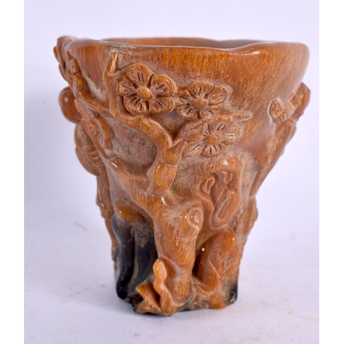 2124 - A CHINESE CARVED BUFFALO HORN TYPE LIBATION CUP 20th Century. 337 grams. 12 cm x 10 cm.