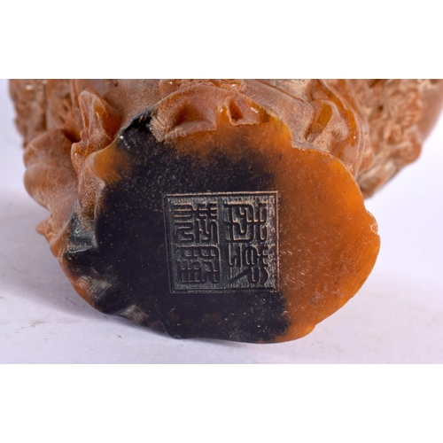 2124 - A CHINESE CARVED BUFFALO HORN TYPE LIBATION CUP 20th Century. 337 grams. 12 cm x 10 cm.