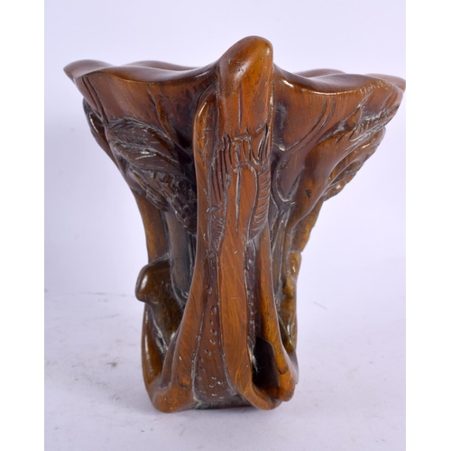 2125 - A CHINESE CARVED BUFFALO HORN TYPE LIBATION CUP 20th Century. 749 grams. 14 cm x 14 cm.