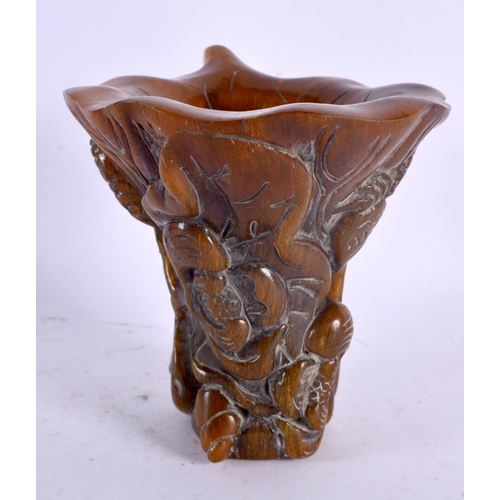 2125 - A CHINESE CARVED BUFFALO HORN TYPE LIBATION CUP 20th Century. 749 grams. 14 cm x 14 cm.