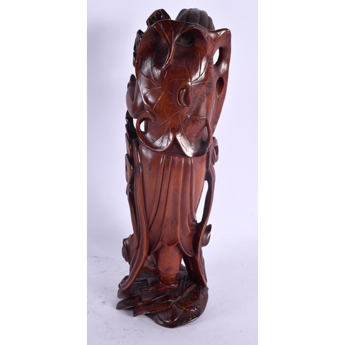 2127 - A 19TH CENTURY CHINESE CARVED HARDWOOD FIGURE OF A MALE Qing. 30 cm high.