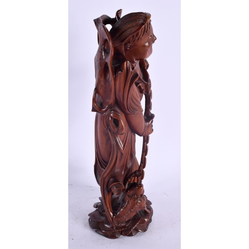 2127 - A 19TH CENTURY CHINESE CARVED HARDWOOD FIGURE OF A MALE Qing. 30 cm high.