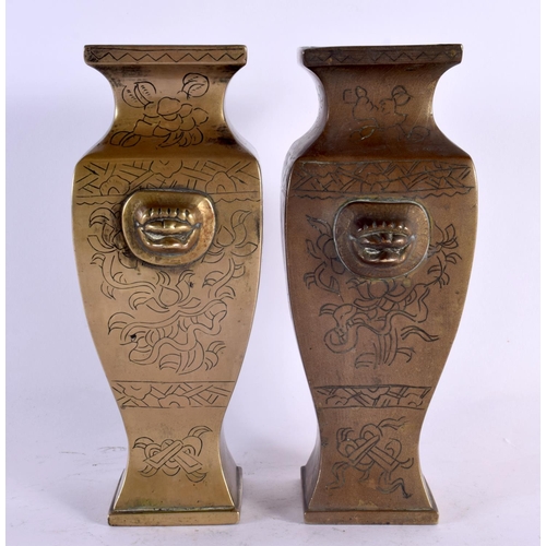 2132 - A PAIR OF 19TH CENTURY CHINESE BRONZE VASES bearing Xuande marks to base, engraved with birds and fo... 