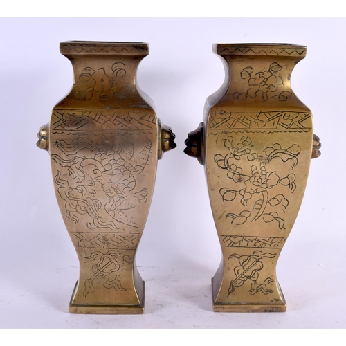 2132 - A PAIR OF 19TH CENTURY CHINESE BRONZE VASES bearing Xuande marks to base, engraved with birds and fo... 