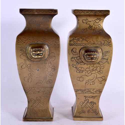 2132 - A PAIR OF 19TH CENTURY CHINESE BRONZE VASES bearing Xuande marks to base, engraved with birds and fo... 