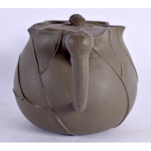 2137 - A CHINESE GREEN YIXING POTTERY TEAPOT AND COVER 20th Century. 15 cm wide.