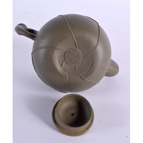 2137 - A CHINESE GREEN YIXING POTTERY TEAPOT AND COVER 20th Century. 15 cm wide.