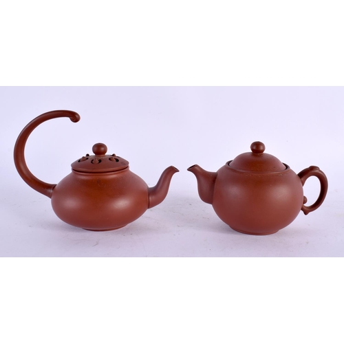 2142 - THREE CHINESE YIXING POTTERY TEAPOTS AND COVERS 20th Century. Largest 14 cm wide. (3)