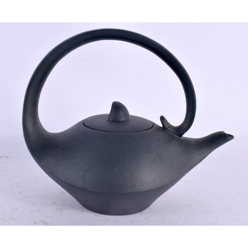 2142 - THREE CHINESE YIXING POTTERY TEAPOTS AND COVERS 20th Century. Largest 14 cm wide. (3)