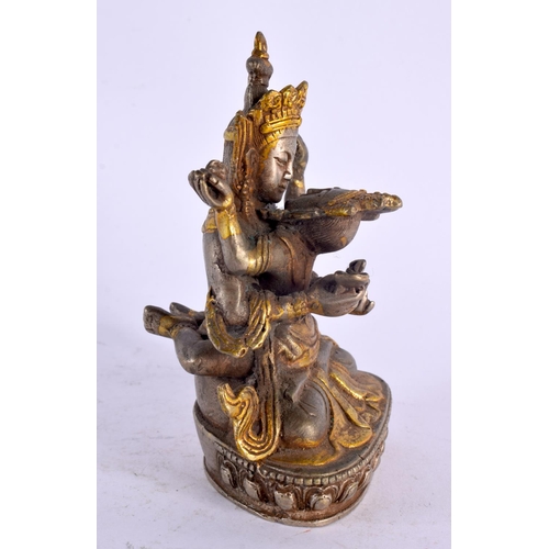 2143 - A CHINESE TIBETAN BRONZE FIGURE OF A BUDDHISTIC GOD 20th Century. 12 cm x 5 cm.