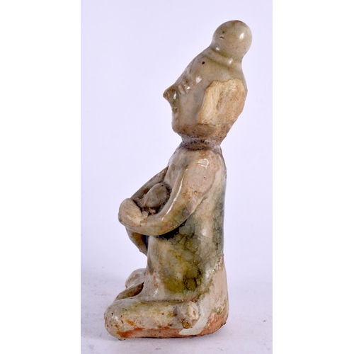 2154 - A 16TH/17TH CENTURY ASIAN EASTERN CELADON BUDDHISTIC FIGURE FIGURE modelled as a mother breast feedi... 