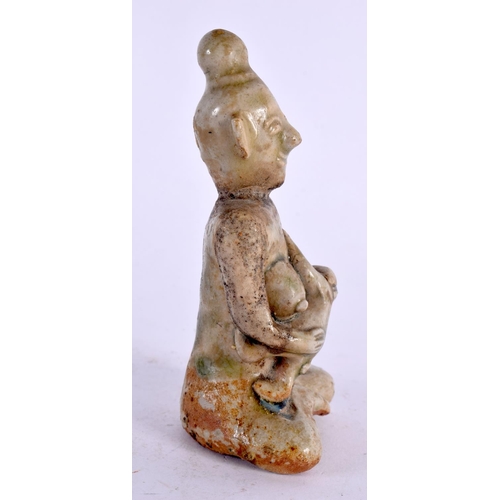 2154 - A 16TH/17TH CENTURY ASIAN EASTERN CELADON BUDDHISTIC FIGURE FIGURE modelled as a mother breast feedi... 