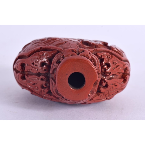 2155 - A 19TH CENTURY CHINESE CARVED CINNABAR LACQUER SNUFF BOTTLE Qing. 6.5 cm x 4.5 cm.