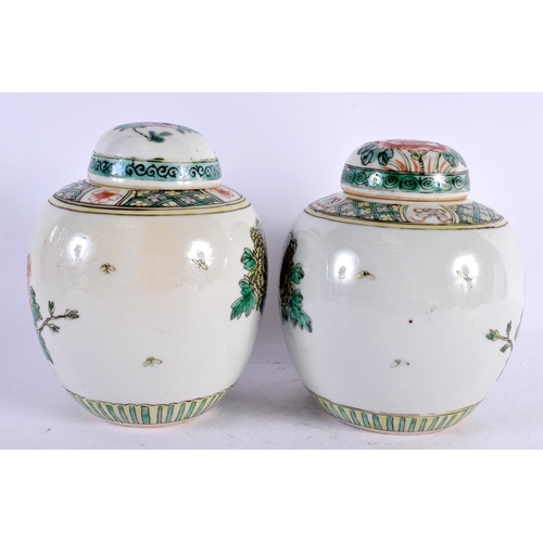 2169 - A PAIR OF 19TH CENTURY CHINESE FAMILLE VERTE GINGER JARS AND COVERS Kangxi style. 17 cm x 12 cm.