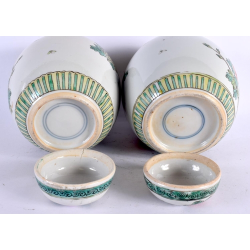 2169 - A PAIR OF 19TH CENTURY CHINESE FAMILLE VERTE GINGER JARS AND COVERS Kangxi style. 17 cm x 12 cm.