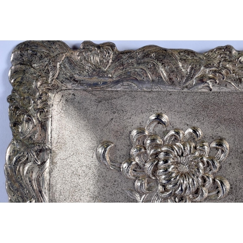 2180 - A LARGE 19TH CENTURY JAPANESE MEIJI PERIOD WHITE METAL REPOUSSE DISH decorated in relief with flower... 