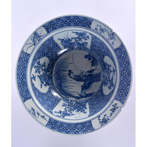 2185 - A LARGE MID 19TH CENTURY CHINESE BLUE AND WHITE PORCELAIN BOWL Qing, painted with two figures within... 