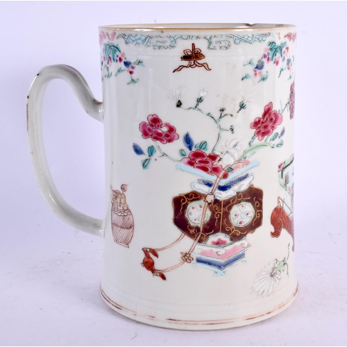 2190 - AN UNUSUALLY LARGE EARLY 18TH CENTURY CHINESE FAMILLE ROSE TANKARD Yongzheng, painted with furniture... 