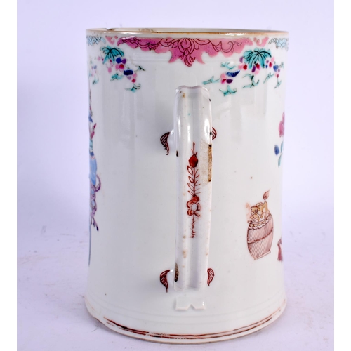 2190 - AN UNUSUALLY LARGE EARLY 18TH CENTURY CHINESE FAMILLE ROSE TANKARD Yongzheng, painted with furniture... 