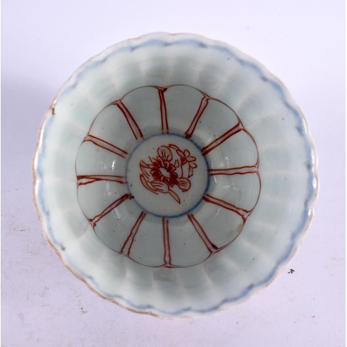 2196 - AN 18TH CENTURY JAPANESE EDO PERIOD FLUTED IMARI TEABOWL painted with stylised flowers. 7 cm x 8 cm.