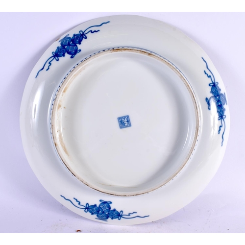 2207 - A JAPANESE TAISHO PERIOD BLUE AND WHITE PORCELAIN PLATE painted with flowers. 30 cm wide.