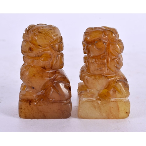 2212 - A PAIR OF 19TH CENTURY CHINESE CARVED SOAPSTONE BUDDHA together with a miniature pair of jade seals.... 