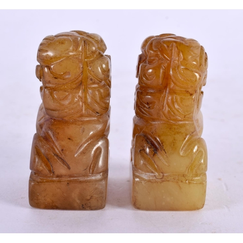 2212 - A PAIR OF 19TH CENTURY CHINESE CARVED SOAPSTONE BUDDHA together with a miniature pair of jade seals.... 