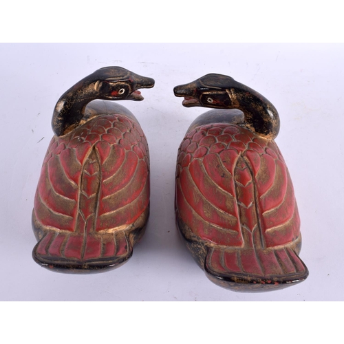 2218 - A PAIR OF CHINESE REPUBLICAN PERIOD POLYCHROMED WOOD DUCKS of naturalistic form. 21 cm wide.