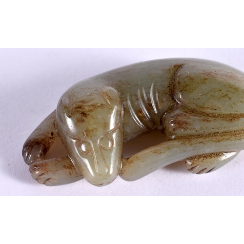 2235 - A CHINESE CARVED JADE FISH 20th Century, together with a jade bird & dog. Largest 8 cm x 3 cm. (3)