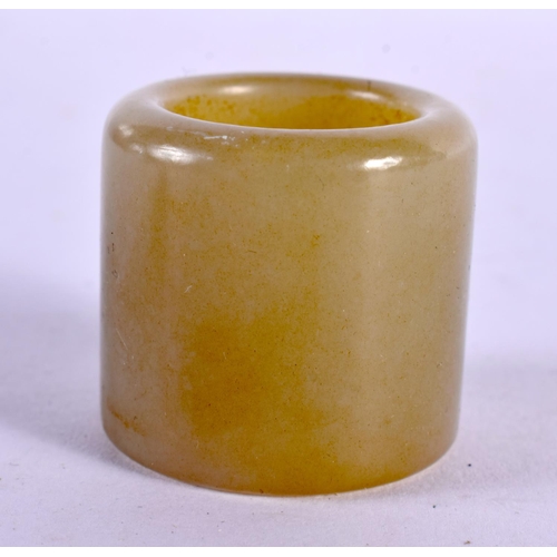 2239 - A CHINESE JADE VASE 20th Century, together with a jade toggle & archers ring. Largest 7 cm x 4.5 cm.... 