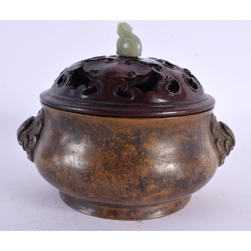 2241 - A CHINESE TWIN HANDLED BRONZE CENSER AND COVER 20th Century, bearing Xuande marks to base, with jade... 