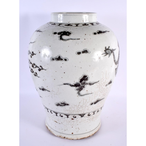 2242 - A LARGE 19TH CENTURY KOREAN BLUE AND WHITE PORCELAIN VASE painted with birds. 42 cm x 25 cm.