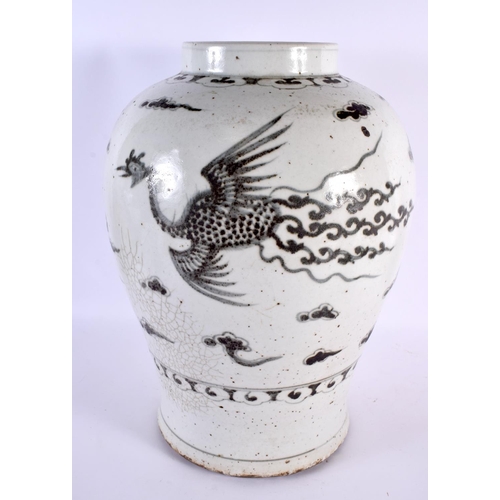 2242 - A LARGE 19TH CENTURY KOREAN BLUE AND WHITE PORCELAIN VASE painted with birds. 42 cm x 25 cm.