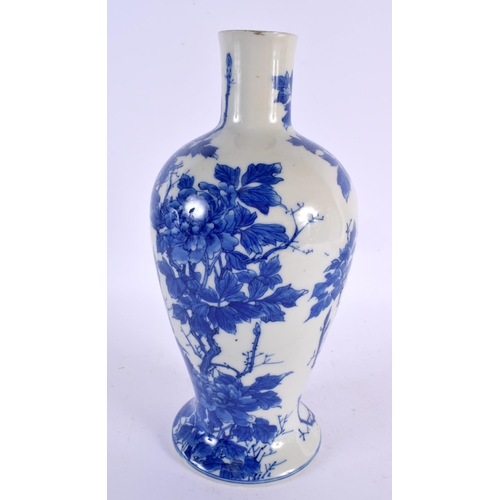 2245 - A 19TH CENTURY JAPANESE MEIJI PERIOD BLUE AND WHITE VASE painted with birds. 28 cm high.