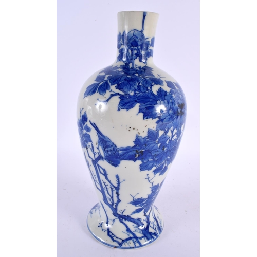 2245 - A 19TH CENTURY JAPANESE MEIJI PERIOD BLUE AND WHITE VASE painted with birds. 28 cm high.