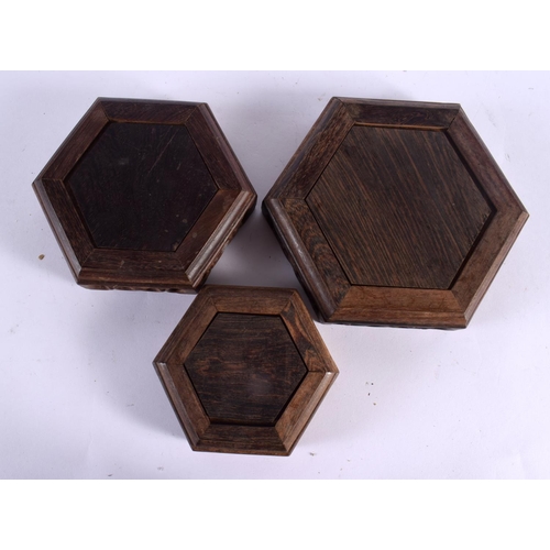 2247 - SIX CHINESE CARVED HARDWOOD GRADUATED STANDS 20th Century. Largest 22 cm square. (6)