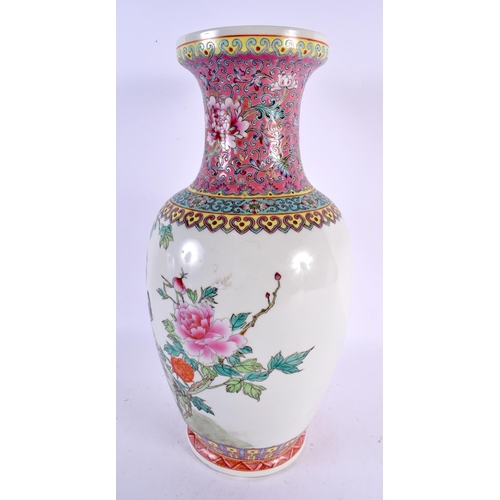 2261 - A LARGE CHINESE REPUBLICAN PERIOD FAMILLE ROSE VASE painted with birds and foliage. 38 cm x 10 cm.