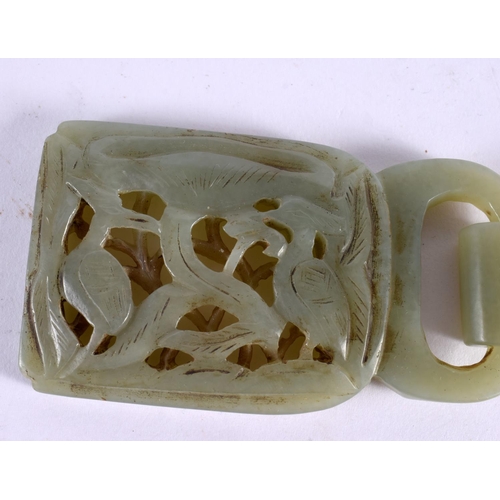 2263 - A CHINESE CARVED GREEN JADE BELT BUCKLE 20th Century, together with a jade fish. Largest 15 cm x 5 c... 