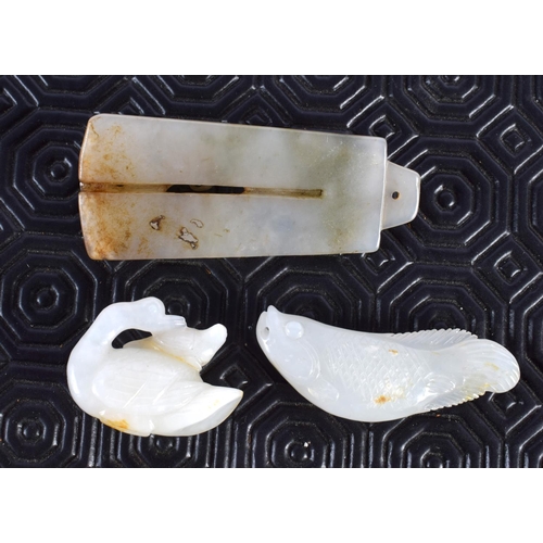 2264 - A CHINESE CARVED WHITE JADE FISH 20th Century, together with a jade duck & plaque. Largest 7 cm x 3 ... 